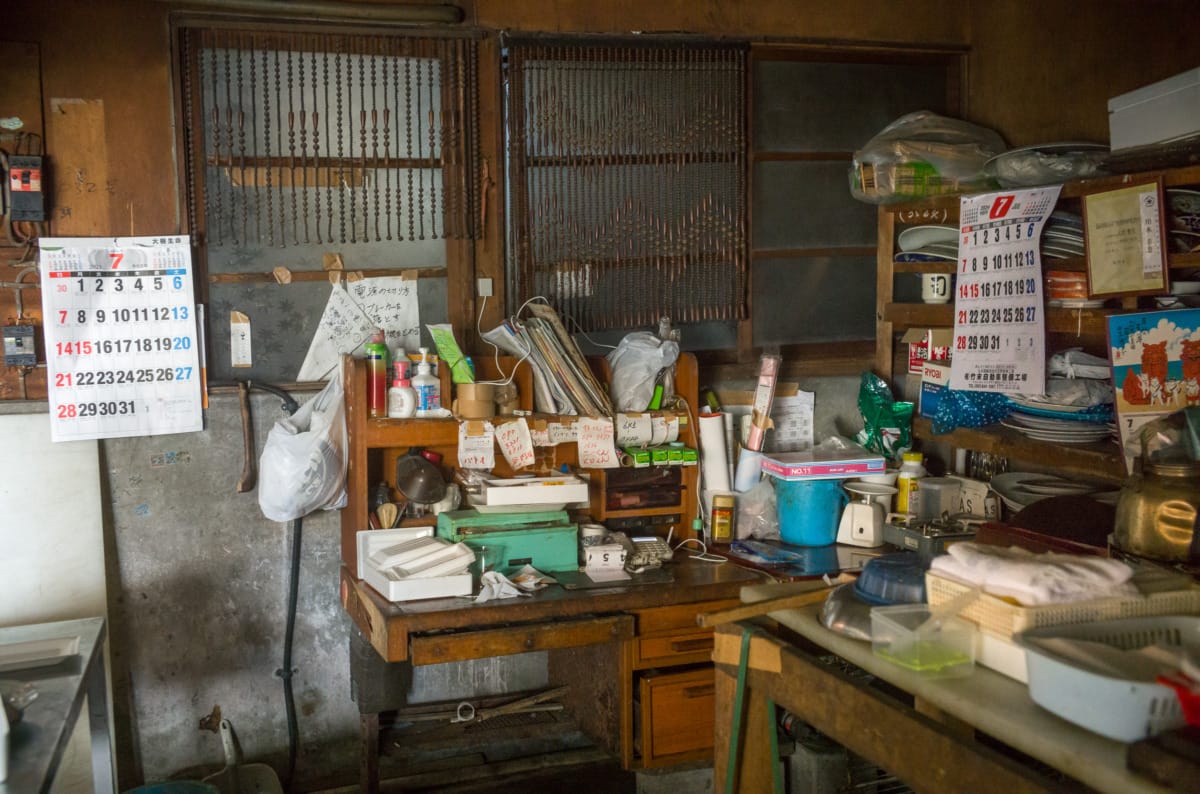 The last shop and dated signs of an old Japanese shopping arcade