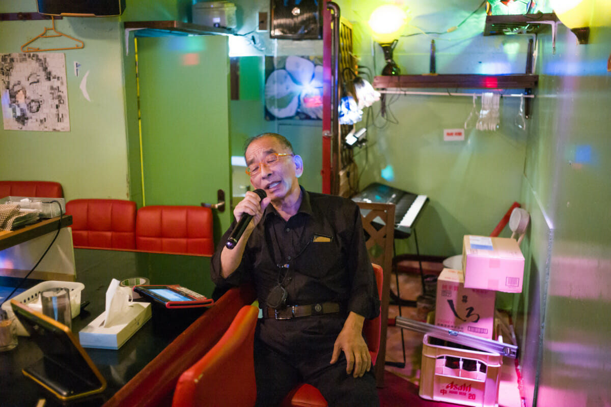 Hugs and stories on a photogenic little Tokyo drinking street