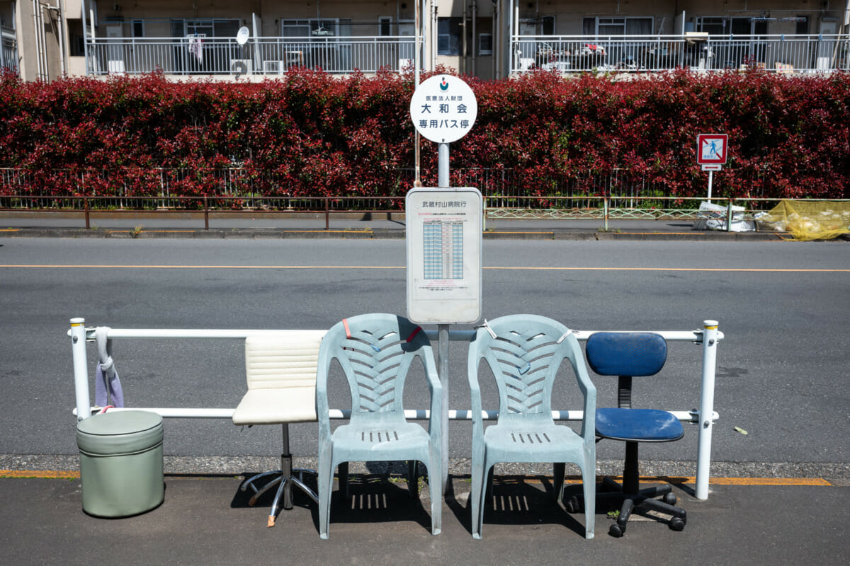 The silence of suburban Tokyo bus stop seats