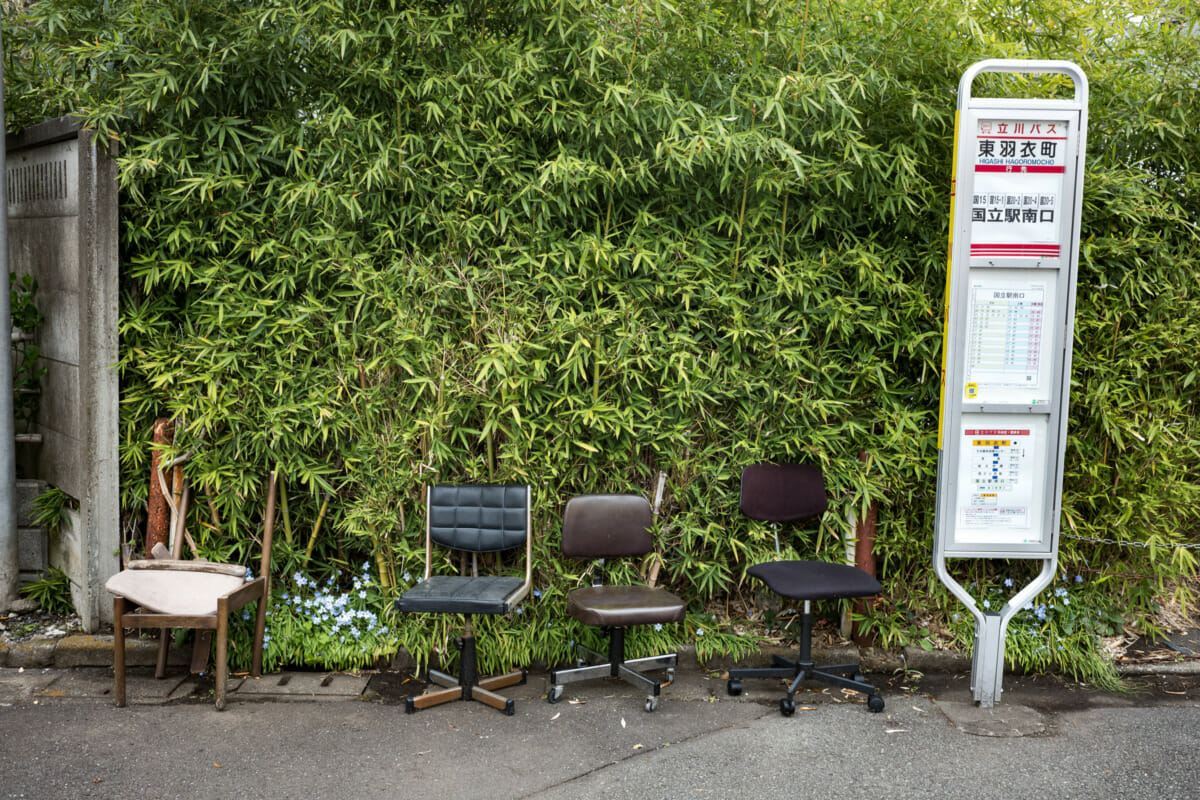 The silence of suburban Tokyo bus stop seats