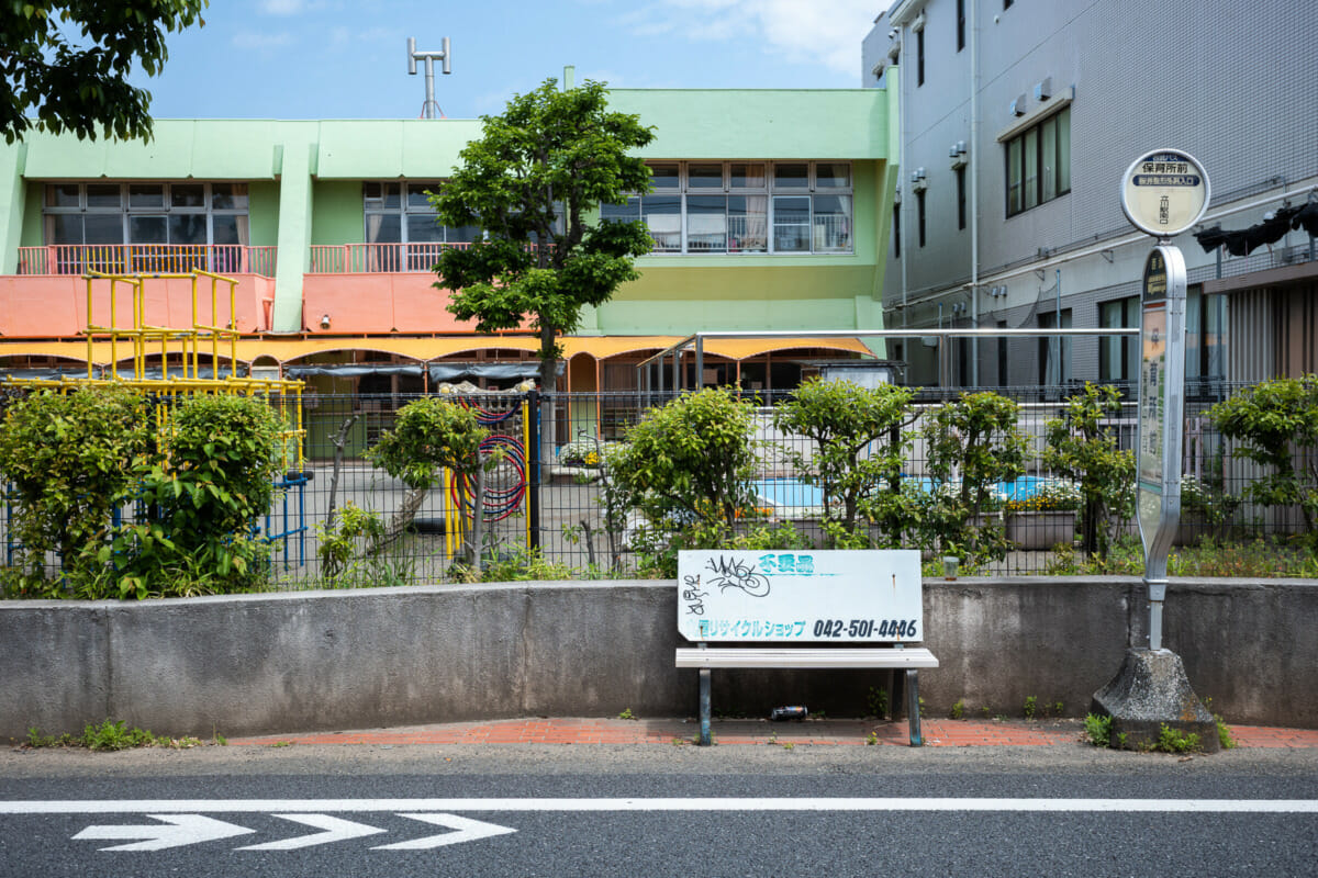 The silence of suburban Tokyo bus stop seats