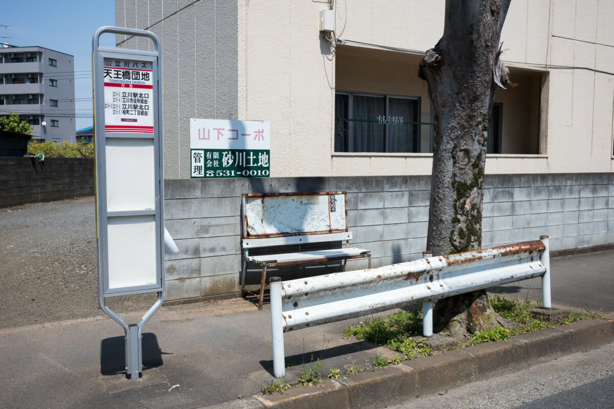 The silence of suburban Tokyo bus stop seats