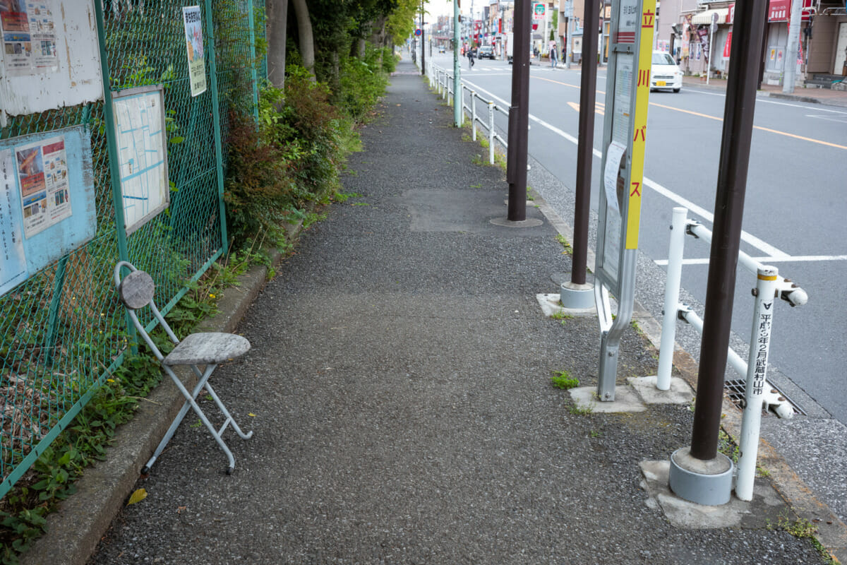 The silence of suburban Tokyo bus stop seats