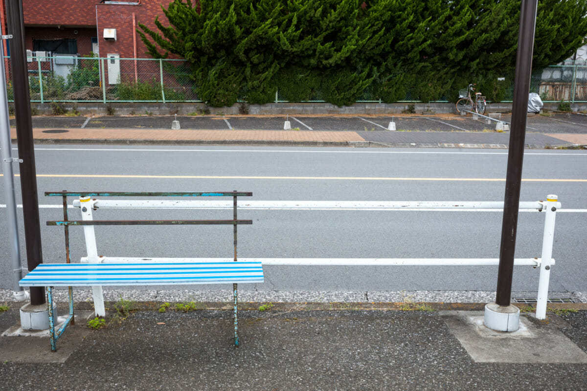 The silence of suburban Tokyo bus stop seats