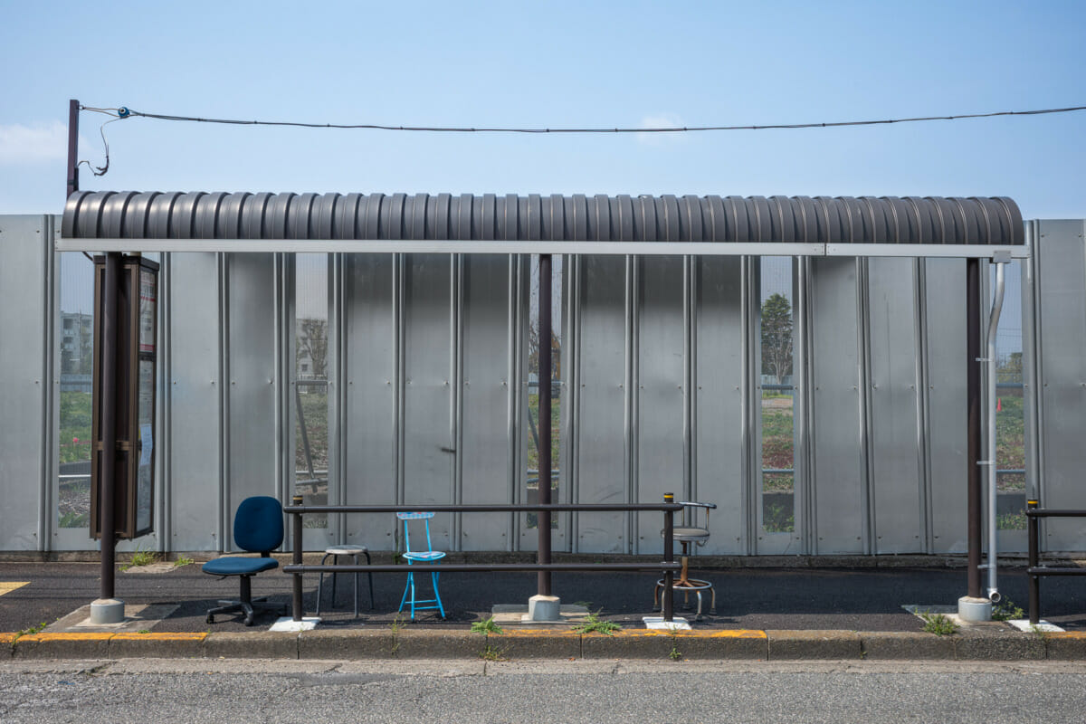 The silence of suburban Tokyo bus stop seats