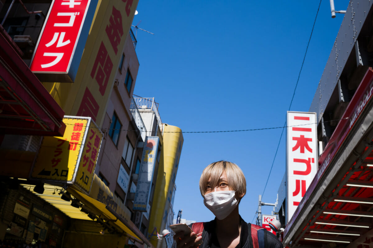 Tokyo eyes, sun and signage