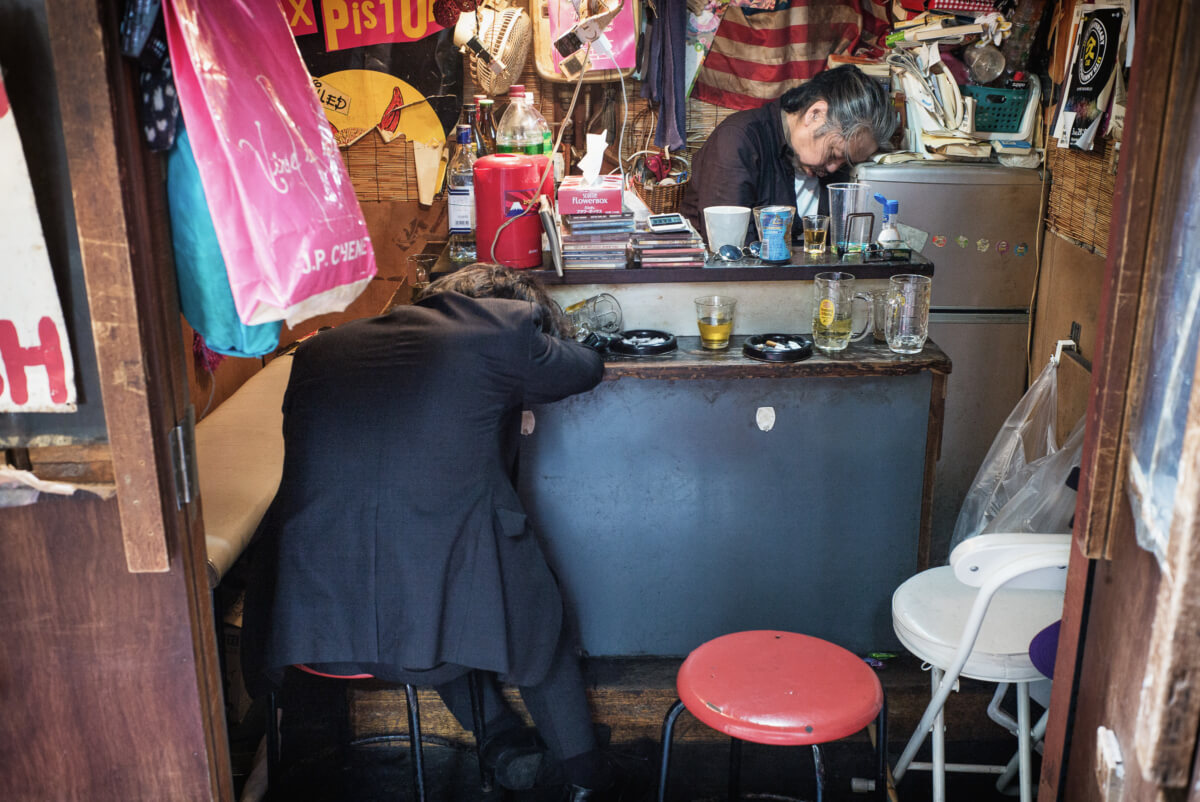 very drunk Japanese in a very small tokyo bar